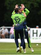 17 August 2022; Mark Adair of Ireland celebrates the wicket of Rahmanullah Gurbaz of Afghanistan with teammate George Dockrell during the Men's T20 International match between Ireland and Afghanistan at Stormont in Belfast. Photo by Harry Murphy/Sportsfile