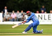 17 August 2022; Usman Ghani of Afghanistan hits a six during the Men's T20 International match between Ireland and Afghanistan at Stormont in Belfast. Photo by Harry Murphy/Sportsfile