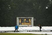 17 August 2022; Groundstaff tend to the crease as rain delays the Men's T20 International match between Ireland and Afghanistan at Stormont in Belfast. Photo by Harry Murphy/Sportsfile