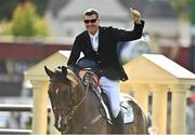 17 August 2022; Paul O'Shea of Ireland celebrates after winning The Sport Ireland Classic on Skara Glen's Machu Picchu during the Longines FEI Jumping Nations Cup Dublin Horse Show at the RDS in Dublin. Photo by Sam Barnes/Sportsfile