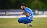 17 August 2022; Naveenulhaq Murid of Afghanistan catches out Paul Stirling of Ireland during the Men's T20 International match between Ireland and Afghanistan at Stormont in Belfast. Photo by Harry Murphy/Sportsfile