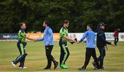 17 August 2022; Ireland and Afghanistan players shake hands after the Men's T20 International match between Ireland and Afghanistan at Stormont in Belfast. Photo by Harry Murphy/Sportsfile