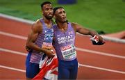 17 August 2022; Matthew Hudson-Smith of Great Britain, left, celebrates winning the men's 400m final with team-mate Alex Haydock-Wilson, who finished third, during day 7 of the European Championships 2022 at the Olympiastadion in Munich, Germany. Photo by Ben McShane/Sportsfile