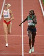 17 August 2022; Rhasidat Adeleke of Ireland, right, on her way to finishing fifth in the women's 400m final with a new national record of 50.53 during day 7 of the European Championships 2022 at the Olympiastadion in Munich, Germany. Photo by Ben McShane/Sportsfile