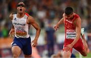 17 August 2022; Pascal Martinot-Lagarde of France, left, celebrates as he crosses the line in second place beside winner Asier Martinez in the Men's 110m hurdles final during day 7 of the European Championships 2022 at the Olympiastadion in Munich, Germany. Photo by David Fitzgerald/Sportsfile