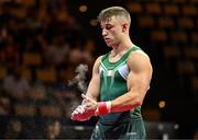 18 August 2022; Ewan McAteer of Ireland powders his hands before competing in the Men's Pommel Horse during day 8 of the European Championships 2022 at the Olympiahalle in Munich, Germany. Photo by Ben McShane/Sportsfile