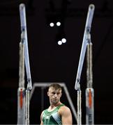 18 August 2022; Ewan McAteer of Ireland prepares to compete in the Parallel Bars during day 8 of the European Championships 2022 at the Olympiahalle in Munich, Germany. Photo by Ben McShane/Sportsfile