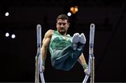18 August 2022; Daniel Fox of Ireland competes in the Parallel Bars during day 8 of the European Championships 2022 at the Olympiahalle in Munich, Germany. Photo by Ben McShane/Sportsfile