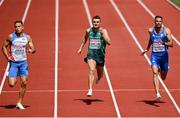 18 August 2022; Marcus Lawlor of Ireland, centre, competing in the Men's 200m heats during day 8 of the European Championships 2022 at the Olympiastadion in Munich, Germany. Photo by David Fitzgerald/Sportsfile