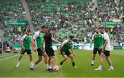 18 August 2022; Shamrock Rovers players warm up before the UEFA Europa League play-off first leg between Ferencváros and Shamrock Rovers at Groupama Aréna in Budapest, Hungary. Photo by Alex Nicodim/Sportsfile