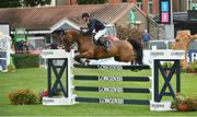 18 August 2022; Julien Gonin of France on Cymba clips a fence while competing in the Clayton Hotel Ballsbridge Speed Derby during the Longines FEI Dublin Horse Show at the RDS in Dublin. Photo by Oliver McVeigh/Sportsfile