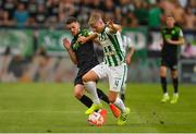 18 August 2022; Mats Knoester of Ferencváros in action against Dylan Watts of Shamrock Rovers during the UEFA Europa League play-off first leg between Ferencváros and Shamrock Rovers at Groupama Aréna in Budapest, Hungary. Photo by Alex Nicodim/Sportsfile