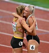 18 August 2022; Ida Karstoft of Denmark, left, is congratulated by Corinna Schwab of Germany after winning heat one of the Women's 200m semi-final during day 8 of the European Championships 2022 at the Olympiastadion in Munich, Germany. Photo by Ben McShane/Sportsfile