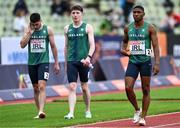 19 August 2022; Ireland runners, from right, Joseph Ojewumi, Mark Smyth and Colin Doyle react after failing to finish the Men's 4x100m Relay during day 9 of the European Championships 2022 at the Olympiastadion in Munich, Germany. Photo by Ben McShane/Sportsfile