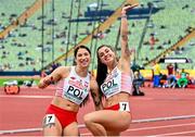 19 August 2022; Magdalena Stefanowicz, right, and Ewa Swoboda of Poland celebrate after finishing 3rd to qualify for the Women's 4x100m Final during day 9 of the European Championships 2022 at the Olympiastadion in Munich, Germany. Photo by Ben McShane/Sportsfile