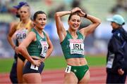 19 August 2022; Sophie Becker, right, and Phil Healy of Ireland react after finishing second to qualify for the Women's 4x400m Relay Final during day 9 of the European Championships 2022 at the Olympiastadion in Munich, Germany. Photo by Ben McShane/Sportsfile