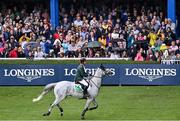 19 August 2022; Spectators watch Cian O'Connor of Ireland competing on Kilkenny in the Longines FEI Jumping Nations Cup™ of Ireland during the Longines FEI Dublin Horse Show at the RDS in Dublin. Photo by Piaras Ó Mídheach/Sportsfile