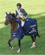 19 August 2022; Conor Swail of Ireland aboard Count Me In celebrates with the Aga Khan trophy after his side's victory in the Longines FEI Jumping Nations Cup™ of Ireland during the Longines FEI Dublin Horse Show at the RDS in Dublin. Photo by Piaras Ó Mídheach/Sportsfile