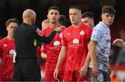 19 August 2022; Referee Neil Doyle speaks to Jack Moylan of Shelbourne and James Clarke of Bohemians during the SSE Airtricity League Premier Division match between Shelbourne and Bohemians at Tolka Park in Dublin. Photo by Ramsey Cardy/Sportsfile