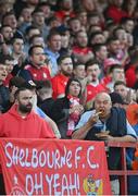 19 August 2022; A Shelbourne supporter eats a curry chip during the SSE Airtricity League Premier Division match between Shelbourne and Bohemians at Tolka Park in Dublin. Photo by Ramsey Cardy/Sportsfile