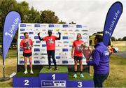 20 August 2022; Irish Life Chief Executive Officer Declan Bolger with men's race top three, Peter Somba of Dunboyne AC, Meath, centre, first, Josh O'Sullivan Hourihan of Donore Harriers AC, Dublin, left, second, and Martin Hoare of Celbridge AC, Kildare, third, during the Irish Life Dublin Race Series Frank Duffy 10 Mile in Phoenix Park in Dublin. Photo by Sam Barnes/Sportsfile