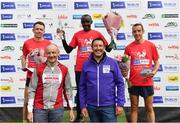 20 August 2022; Irish Life Chief Executive Declan Bolger, front right, and Civil Service Harriers Chairperson Owen McFeely, front left, with men's race top three, Peter Somba of Dunboyne AC, Meath, centre, first, Josh O'Sullivan Hourihan of Donore Harriers AC, Dublin, left, second, and Martin Hoare of Celbridge AC, Kildare, third, during the Irish Life Dublin Race Series Frank Duffy 10 Mile in Phoenix Park in Dublin. Photo by Sam Barnes/Sportsfile