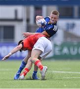 20 August 2022; Darragh Farrell of Leinster is tackled by Michael O'Donovan of Munster during the U18 Clubs Interprovincial Series 2022 match between Leinster and Munster at Energia Park in Dublin. Photo by Piaras Ó Mídheach/Sportsfile