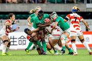 20 August 2022; Linda Djougang of Ireland is tackled by the Japan defence during the Women's Rugby Summer Tour match between Japan and Ireland at Ecopa Stadium in Shizouka, Japan. Photo by Sportsfile