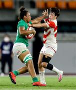 20 August 2022; Grace Moore of Ireland is tackled during the Women's Rugby Summer Tour match between Japan and Ireland at Ecopa Stadium in Shizouka, Japan. Photo by Sportsfile