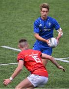 20 August 2022; Jules Fenelon of Leinster in action against Ben O'Connor of Munster during the U19 Interprovincial Series match between Leinster and Munster at Energia Park in Dublin. Photo by Piaras Ó Mídheach/Sportsfile
