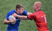 20 August 2022; Finn Treacy of Leinster in action against Seán Condon of Munster during the U19 Interprovincial Series match between Leinster and Munster at Energia Park in Dublin. Photo by Piaras Ó Mídheach/Sportsfile