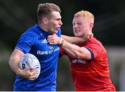 20 August 2022; Finn Treacy of Leinster is tackled by Sean Condon of Munster during the U19 Interprovincial Series match between Leinster and Munster at Energia Park in Dublin. Photo by Piaras Ó Mídheach/Sportsfile