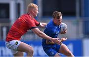 20 August 2022; Jack Murphy of Leinster in action against Sean Condon of Munster during the U19 Interprovincial Series match between Leinster and Munster at Energia Park in Dublin. Photo by Piaras Ó Mídheach/Sportsfile