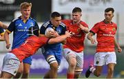 20 August 2022; Aaron O'Brien of Leinster in action against Oisín Minogue, left, and Jack Ryan of Munster during the U18 Schools Interprovincial Series match between Leinster and Munster at Energia Park in Dublin. Photo by Piaras Ó Mídheach/Sportsfile