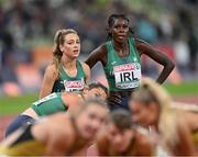 20 August 2022; Sophie Becker, left, and Rhasidat Adeleke of Ireland after the Women's 4x400m Relay Final during day 10 of the European Championships 2022 at the Olympiastadion in Munich, Germany. Photo by Ben McShane/Sportsfile