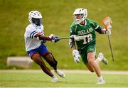 20 August 2022; Conor Foley of Ireland in action against Nelson Telemaco of  Puerto Rico during the 2022 World Lacrosse Men's U21 World Championship 7th place match between Ireland and Puerto Rico at the University of Limerick in Limerick. Photo by Tom Beary/Sportsfile
