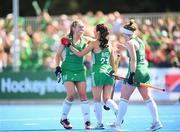 21 August 2022; Katie McKee of Ireland is congratulated by team-mates Charlotte Beggs, left, and Naomi Carroll, right, after scoring their side's third goal during the Women's 2022 EuroHockey Championship Qualifier match between Ireland and Turkey at Sport Ireland Campus in Dublin. Photo by Stephen McCarthy/Sportsfile