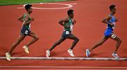 21 August 2022; Hiko Tonosa Haso, centre, and Efrem Gidey, left, of Ireland during the Men's 10000m Final during day 11 of the European Championships 2022 at the Olympiastadion in Munich, Germany. Photo by David Fitzgerald/Sportsfile