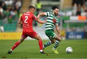 21 August 2022; Richie Towell of Shamrock Rovers in action against Lewis Macari of Dundalk during the SSE Airtricity League Premier Division match between Shamrock Rovers and Dundalk at Tallaght Stadium in Dublin. Photo by Stephen McCarthy/Sportsfile