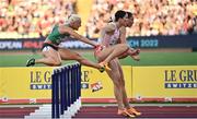 21 August 2022; Sarah Lavin of Ireland, left, on her way to finishing third in Heat 2 of the Women's 100m Hurdles Semi Final during day 11 of the European Championships 2022 at the Olympiastadion in Munich, Germany. Photo by David Fitzgerald/Sportsfile