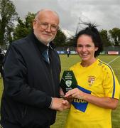 20 August 2022; Fran Gavin, FAI Data Registrations & Competitions Manager, presents the Player of the Match Award to Leeann Payne of Terenure Rangers after the FAI Women's Intermediate Shield Final 2022 match between Terenure Rangers and Corrib Celtic FC at Leah Victoria Park in Tullamore, Offaly. Photo by Ray McManus/Sportsfile