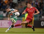 21 August 2022; Jack Byrne of Shamrock Rovers in action against Lewis Macari of Dundalk during the SSE Airtricity League Premier Division match between Shamrock Rovers and Dundalk at Tallaght Stadium in Dublin. Photo by Stephen McCarthy/Sportsfile