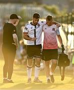 12 August 2022; Patrick Hoban of Dundalk leaves the field after picking up an injury, with the help of Dundalk chartered physiotherapist Danny Miller, right, as Dundalk head coach Stephen O'Donnell, left, reacts during the SSE Airtricity League Premier Division match between Bohemians and Dundalk at Dalymount Park in Dublin. Photo by Sam Barnes/Sportsfile