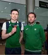 22 August 2022; Mark English of Ireland, left, who won a bronze medal in the men's 800m final, pictured with his coach Feidhlim Kelly at Dublin Airport on the team's return from the European Championships in Munich. Photo by Harry Murphy/Sportsfile