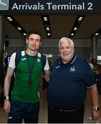 22 August 2022; Mark English of Ireland, who won a bronze medal in the men's 800m final, left, pictured with Athletics Ireland President John Cronin as he arrives at Dublin Airport on the team's return from the European Championships in Munich. Photo by Harry Murphy/Sportsfile