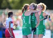 21 August 2022; Sarah Hawkshaw of Ireland is congratulated by team-mates Katie Mullan, left, and Niamh Carey, right, after scoring their side's seventh goal during the Women's 2022 EuroHockey Championship Qualifier match between Ireland and Turkey at Sport Ireland Campus in Dublin. Photo by Stephen McCarthy/Sportsfile