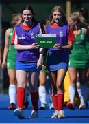 21 August 2022; Ball patrol girls lead the Ireland players to the medal ceremony after the Women's 2022 EuroHockey Championship Qualifier match between Ireland and Turkey at Sport Ireland Campus in Dublin. Photo by Stephen McCarthy/Sportsfile