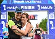 20 August 2022; Marc and Gillian Lennon, both from Dublin, celebrate after finishing the Irish Life Dublin Race Series Frank Duffy 10 Mile in Phoenix Park in Dublin. Photo by Sam Barnes/Sportsfile