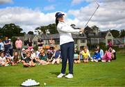 23 August 2022; Irish LPGA star, and The K Club’s touring professional, Leona Maguire during a golf clinic with 32 very lucky children, invited from Straffan primary school, Scoil Bhríde, and the local Straffan area at The K Club in Straffan, Kildare. Photo by Ramsey Cardy/Sportsfile