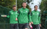 24 August 2022; Ronan Finn, centre, with teammates Dylan Watts, left, and Sean Kavanagh before a Shamrock Rovers squad training session at Roadstone Sports Club in Dublin. Photo by Seb Daly/Sportsfile